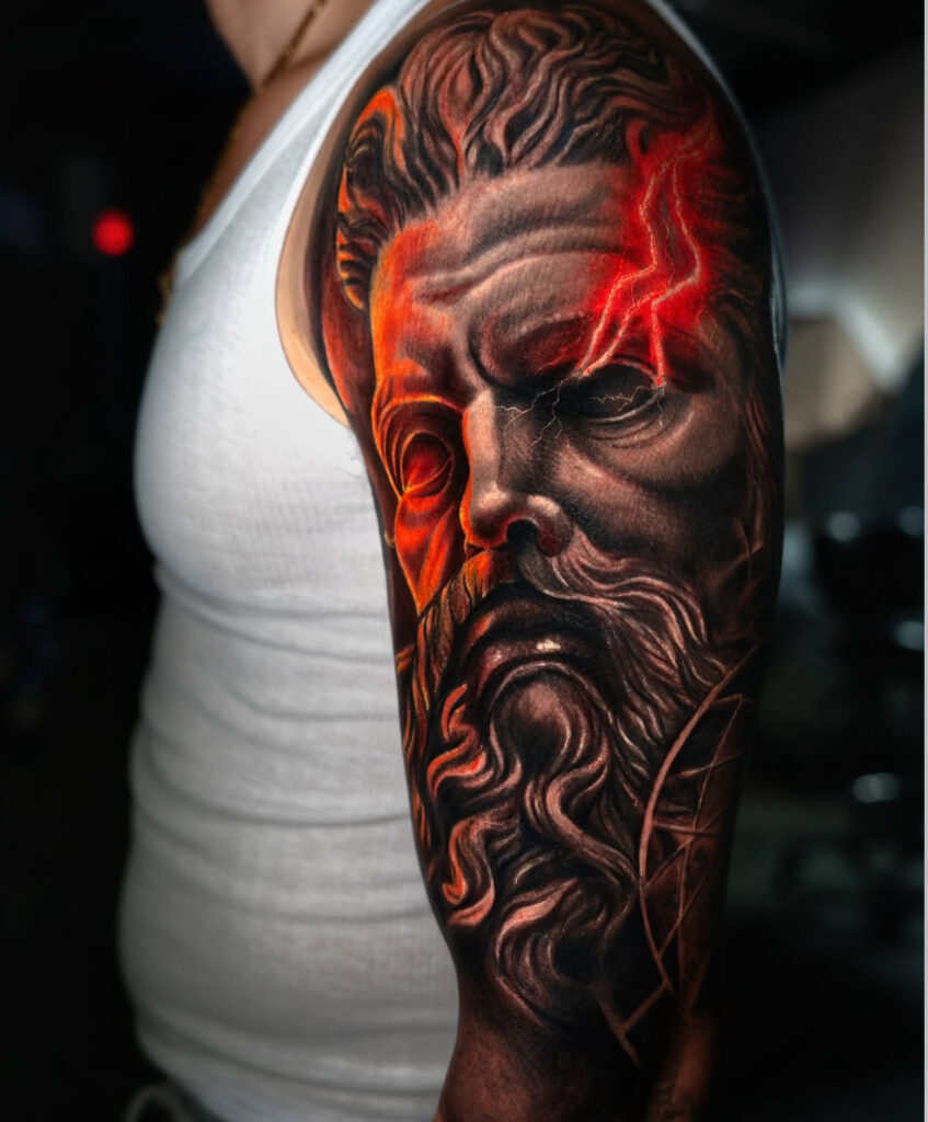 Realism, zeus, black and grey, gray, color, red, lighting, greek mythology, face, portrait, photo of tattoo